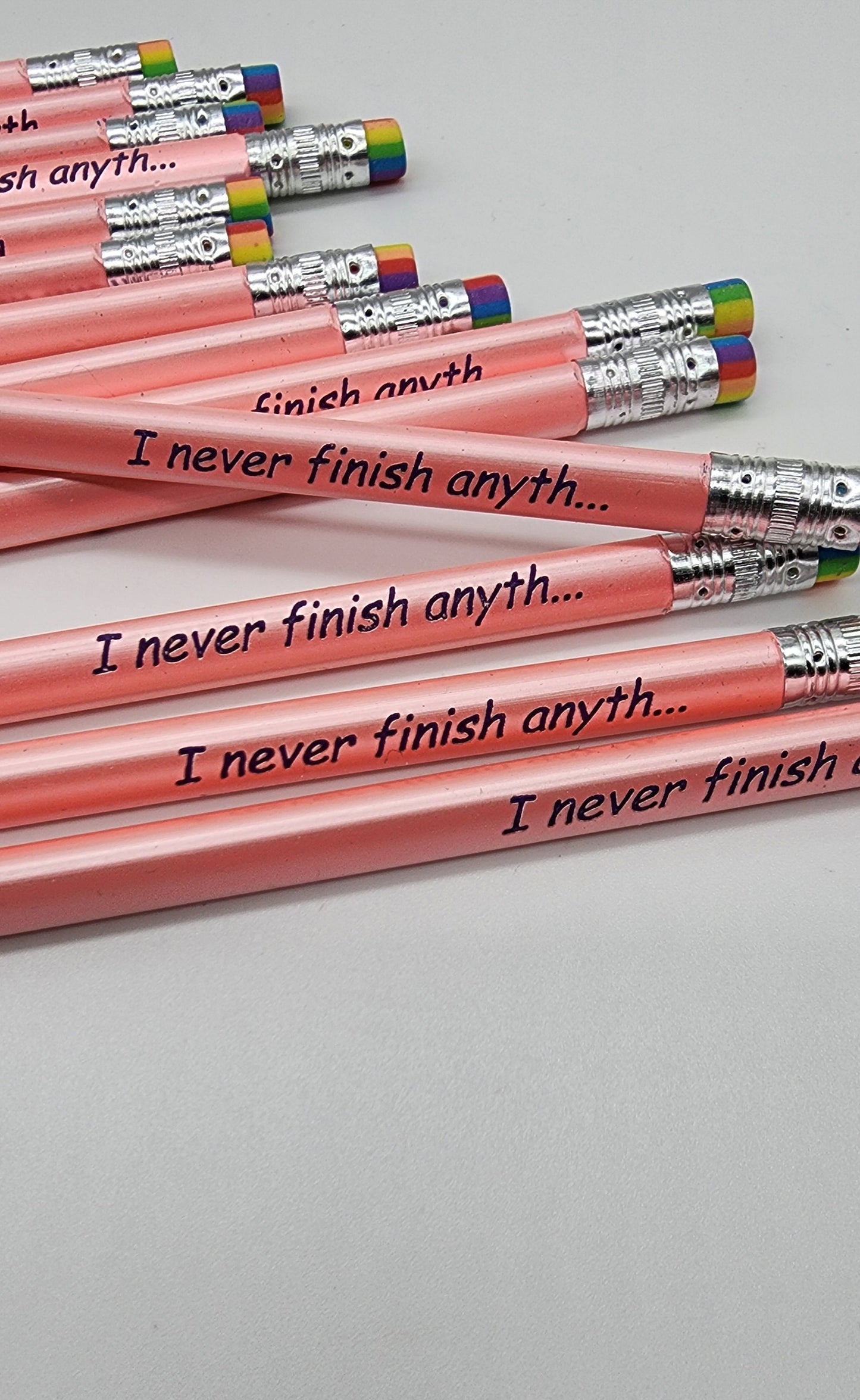 " I never finish anythi..." Triangle, rainbow pencil