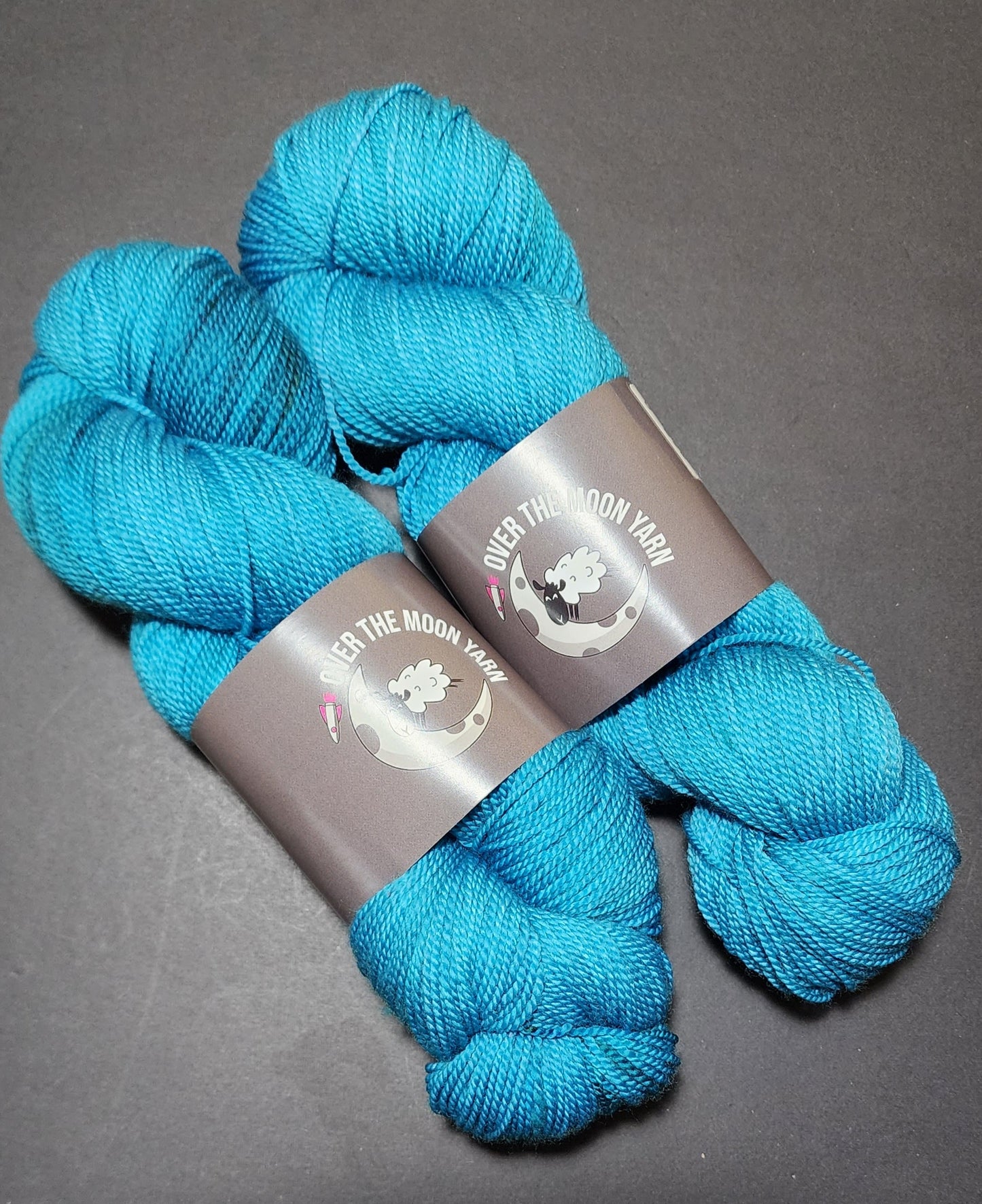 The Universe is Turquiose - Ion Fingering, 100 gram, 360 m, Speckled Yarn